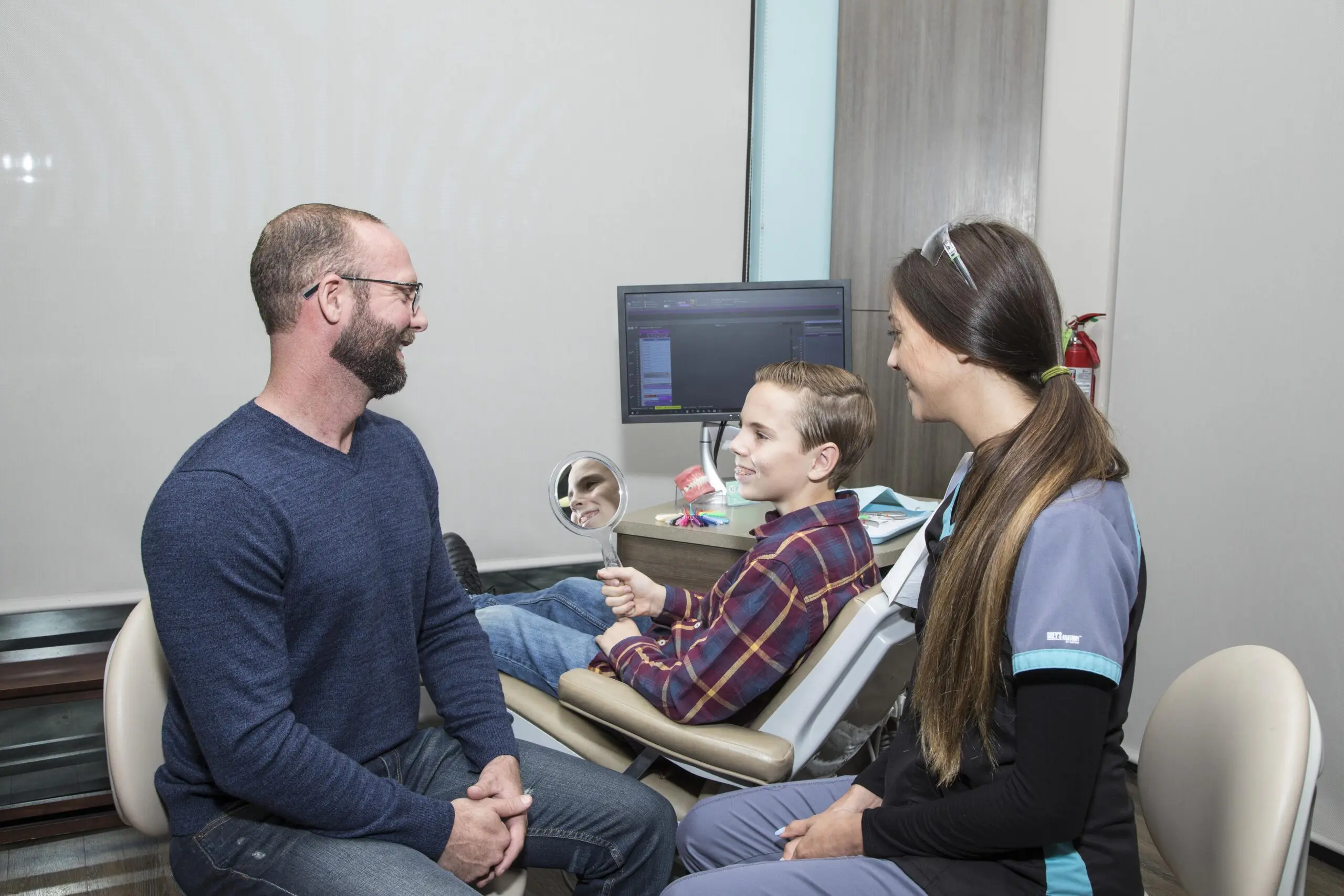 Staff and patients discuss Braces Cost at Gianquinto Orthodontic Arts in Bakersfield, Tehachapi or Mammoth Lakes, CA