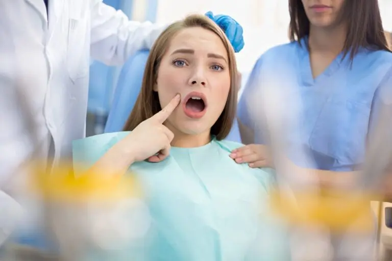 girl in dental ambulance show sore spot - overbite vs underbite in Bakersfield and Tehachapi, CA.