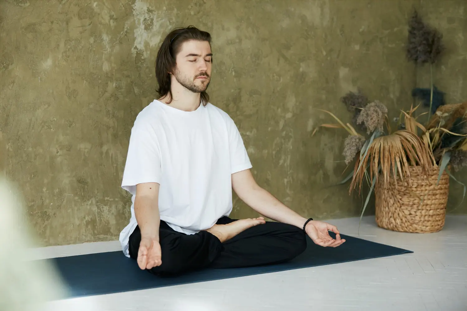 A man concentrating on yoga asana shows the impact of mouth breathing on oral health and bad breath for Gianquinto Orthodontic Arts in Bakersfield, Tehachapi or Mammoth Lakes, CA