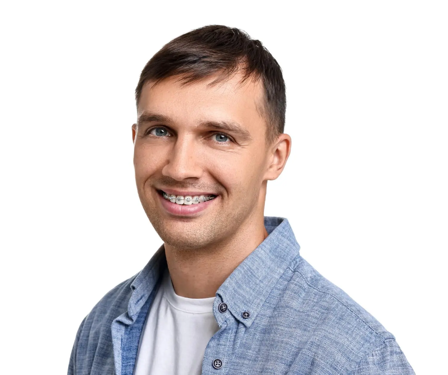 Smiling man with short brown hair and metal braces recommended Gianquinto Orthodontic Arts in Bakersfield, Tehachapi or Mammoth Lakes, CA