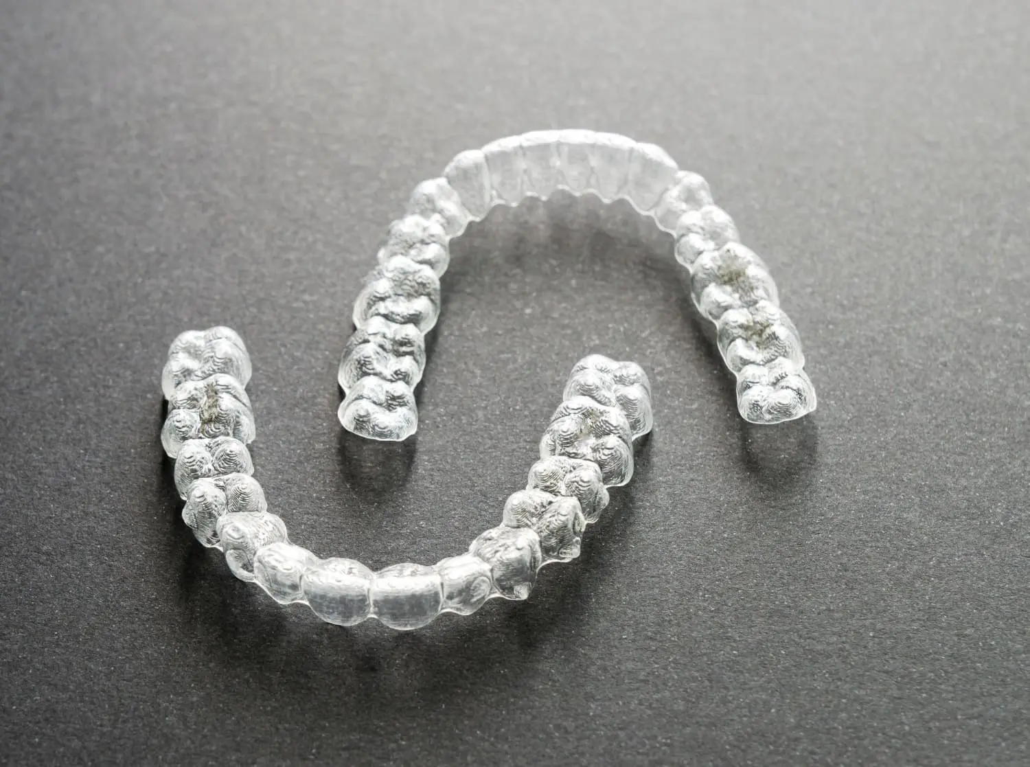 Clear dental aligners, like Invisalign, from Gianquinto Orthodontic Arts in Bakersfield, CA